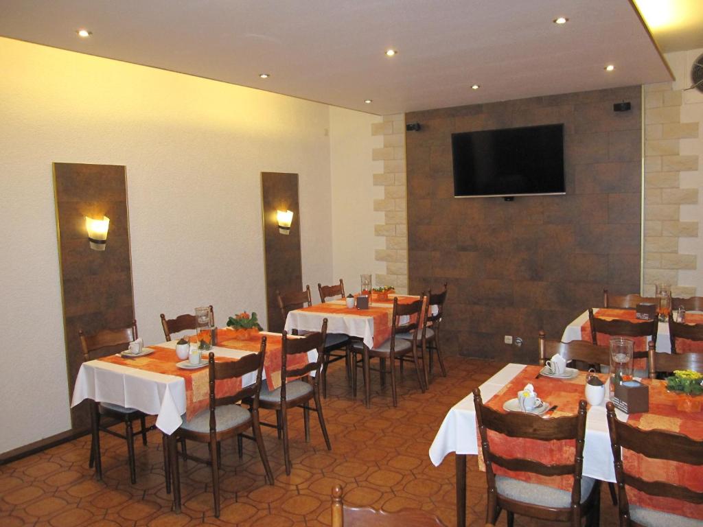 TV a/nebo společenská místnost v ubytování Hotel Nußknacker