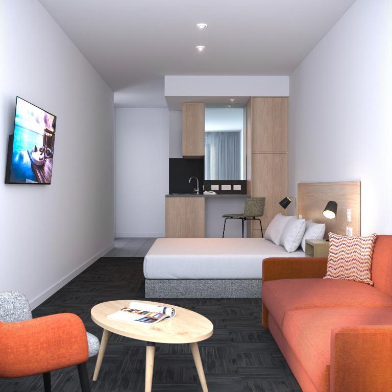 Postel nebo postele na pokoji v ubytování Toms Court Hotel