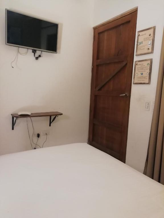 Postel nebo postele na pokoji v ubytování Casa Ebano 967