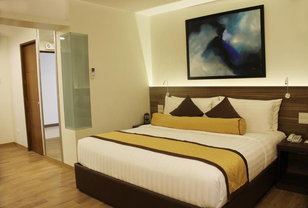 Postel nebo postele na pokoji v ubytování Hotel Marciano