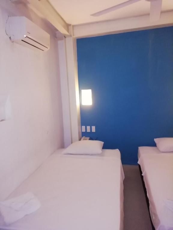 Postel nebo postele na pokoji v ubytování Casa Ebano 967