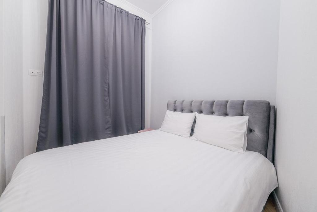 Posteľ alebo postele v izbe v ubytovaní Apartments in Minsk