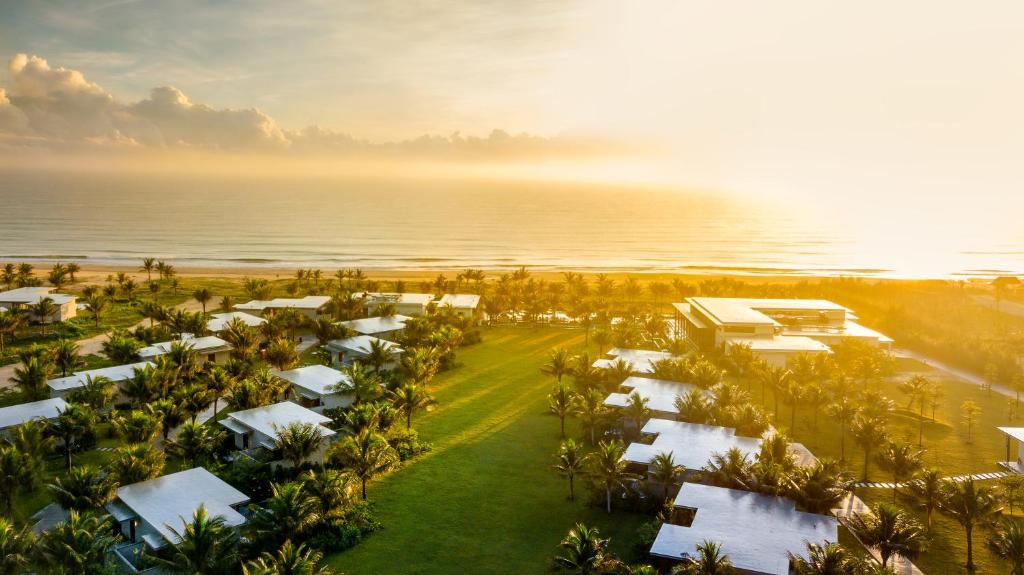 an aerial view of a resort on the beach at Maia Resort Quy Nhon in Quy Nhon