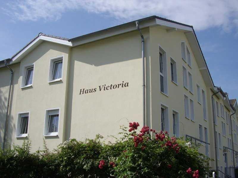 a building with the words harris victoria on it at Penthouse STRANDBURG mit Meerblick in Sassnitz