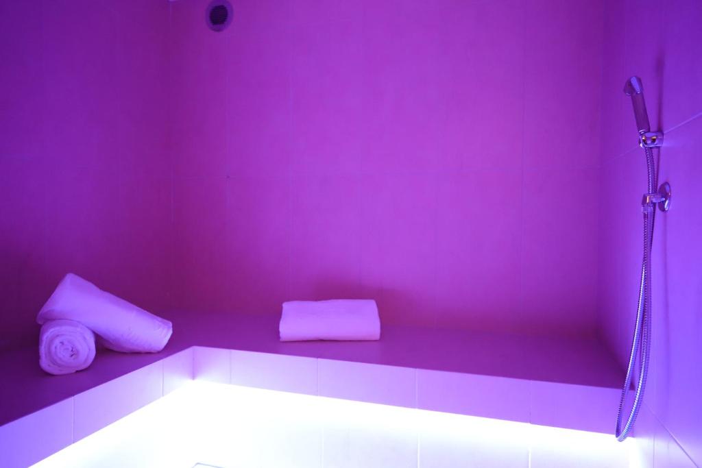 Postel nebo postele na pokoji v ubytování Hotel Villa Imperina