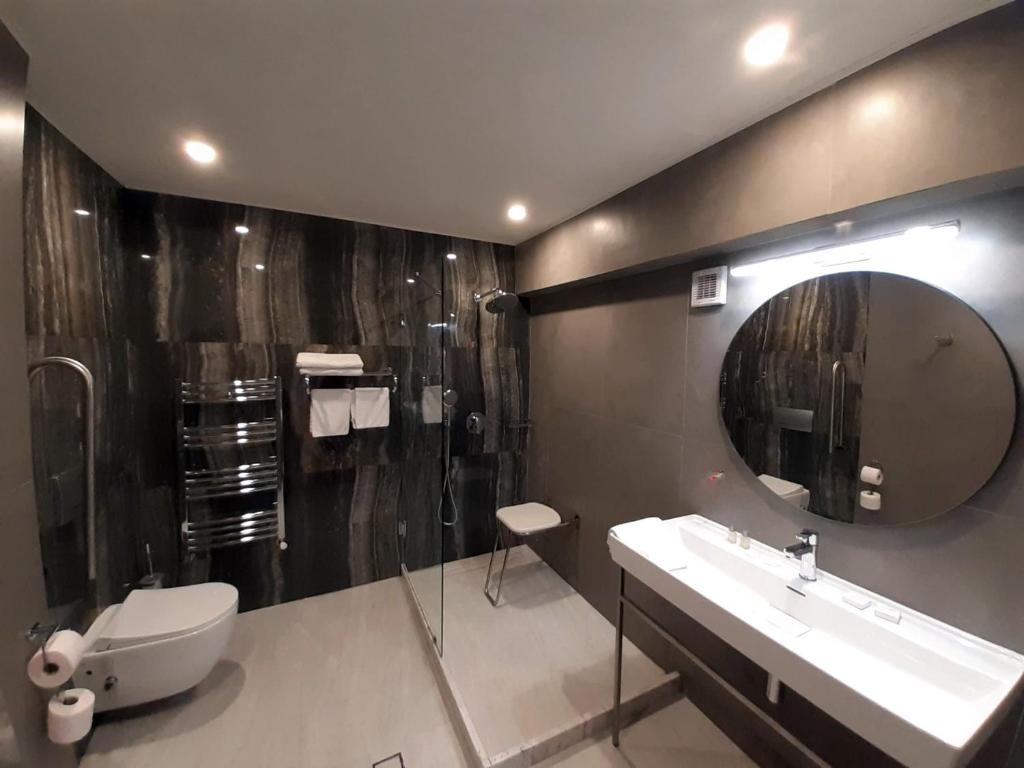 Koupelna v ubytování Hotel Univers