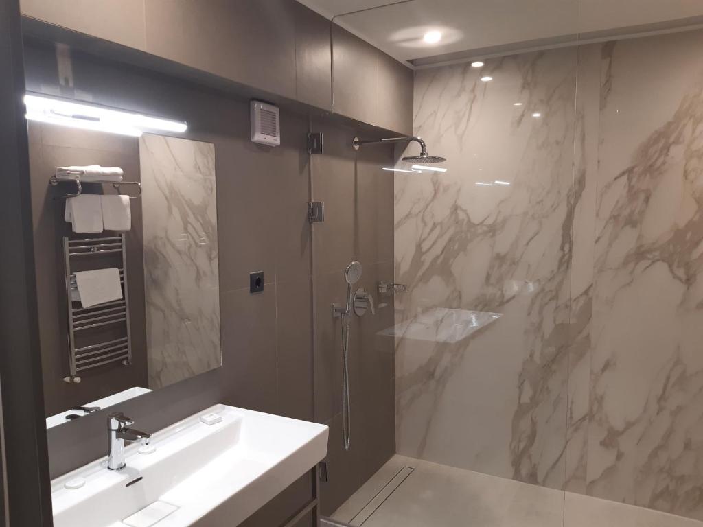 Koupelna v ubytování Hotel Univers