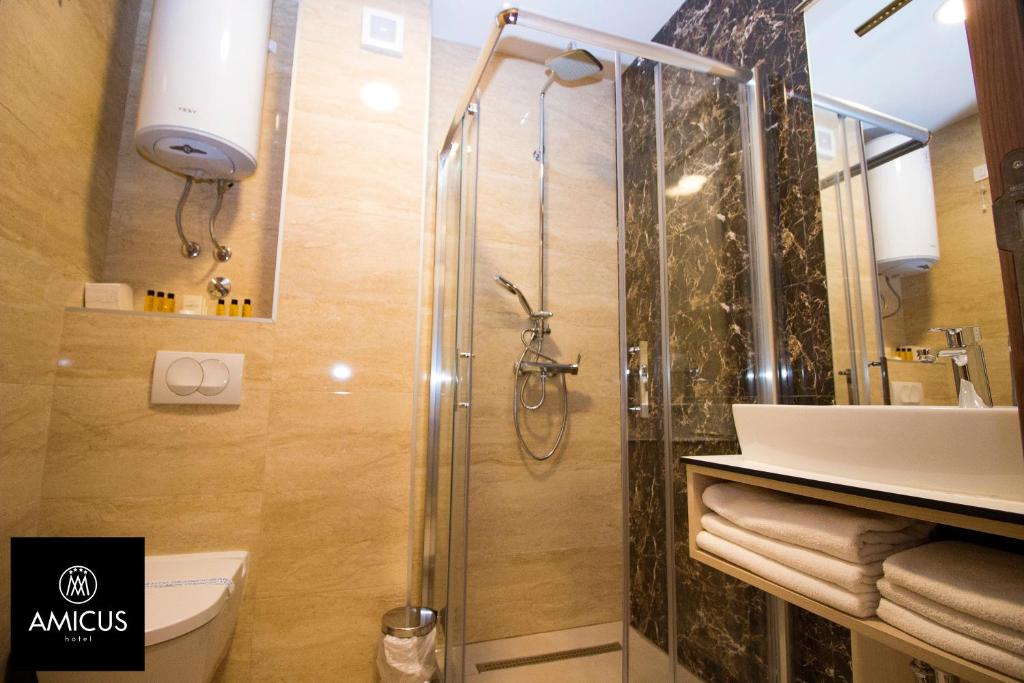 Koupelna v ubytování Hotel Amicus