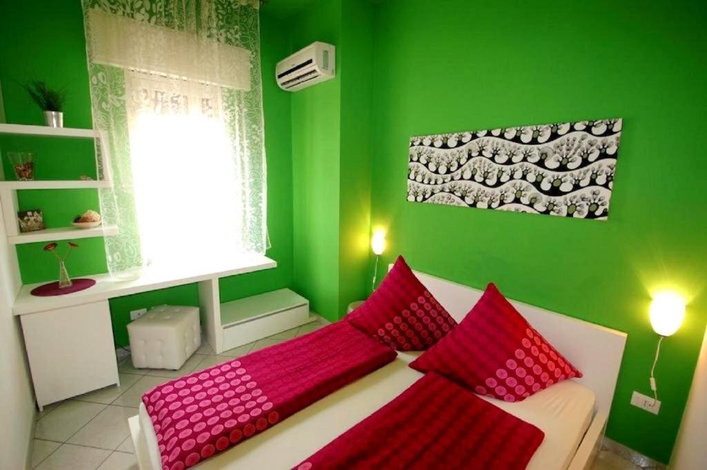 A bed or beds in a room at Il Muretto