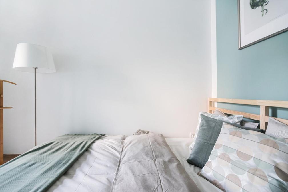 Posteľ alebo postele v izbe v ubytovaní Caring Family Apartment Close To The Center