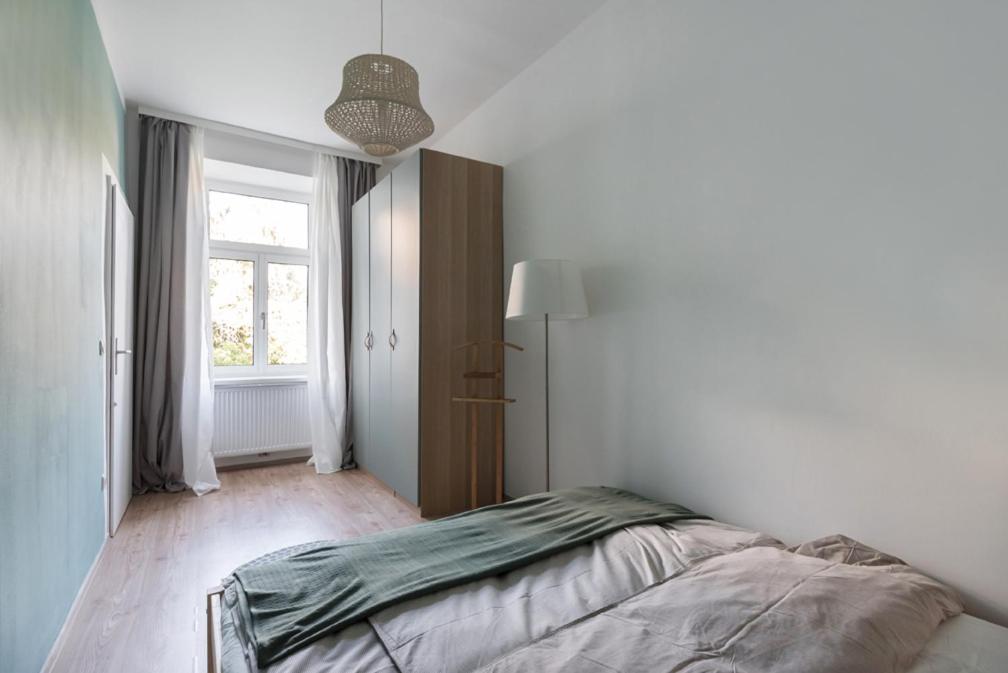 Posteľ alebo postele v izbe v ubytovaní Caring Family Apartment Close To The Center