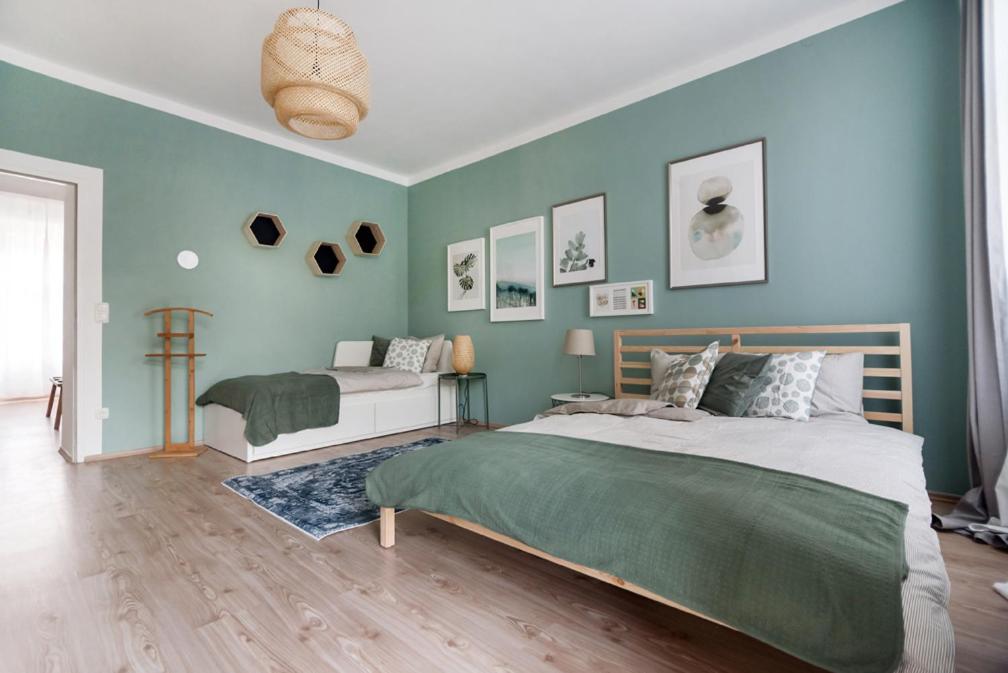 Posteľ alebo postele v izbe v ubytovaní Caring Family Apartment Close To The Center