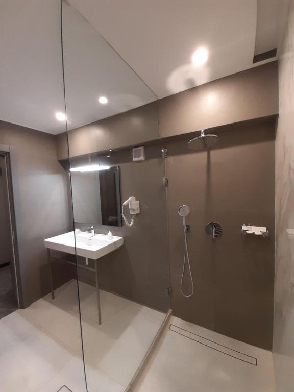 Koupelna v ubytování Hotel Univers