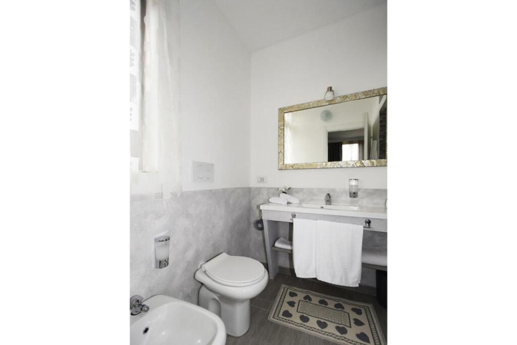 Kúpeľňa v ubytovaní ILLUVIA affitto camere