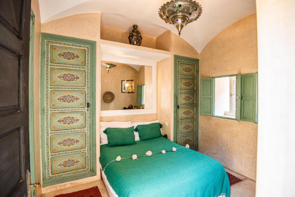 Postel nebo postele na pokoji v ubytování Riad Spa Sindibad