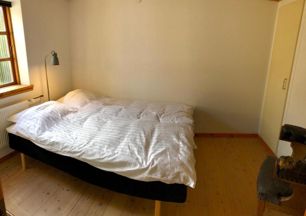 Postel nebo postele na pokoji v ubytování Torvet 19 - Maribo