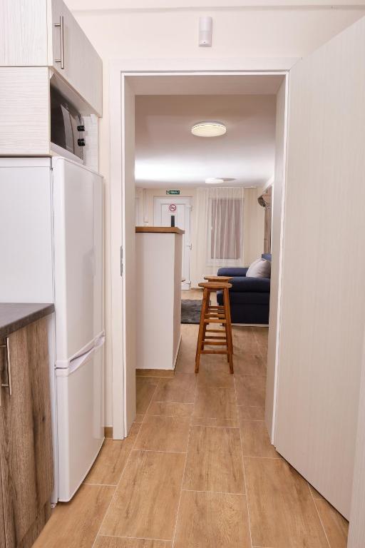 Kuchyň nebo kuchyňský kout v ubytování Kincses Sziget Apartman