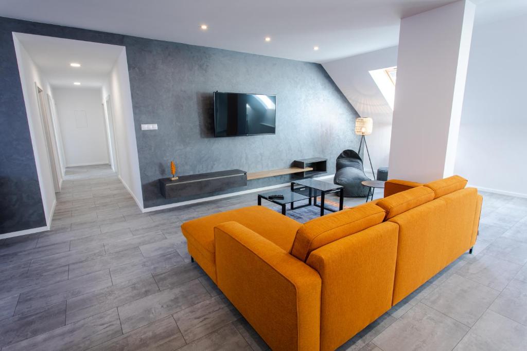 TV a/nebo společenská místnost v ubytování Hotel Novy Kastiel - Self check-in