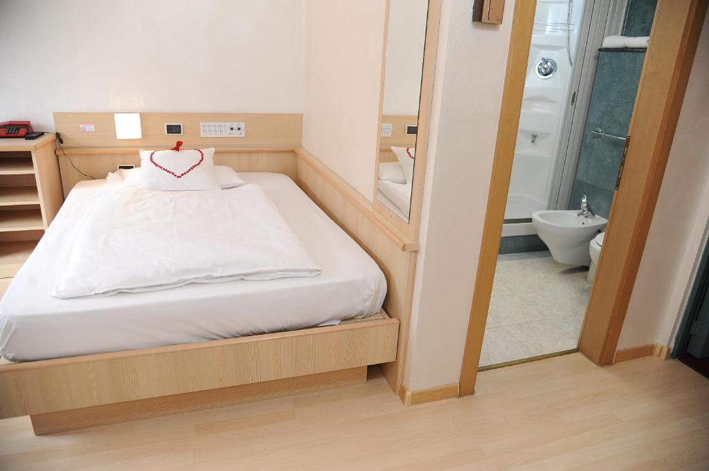 Postel nebo postele na pokoji v ubytování Hotel Sole Family Hotel
