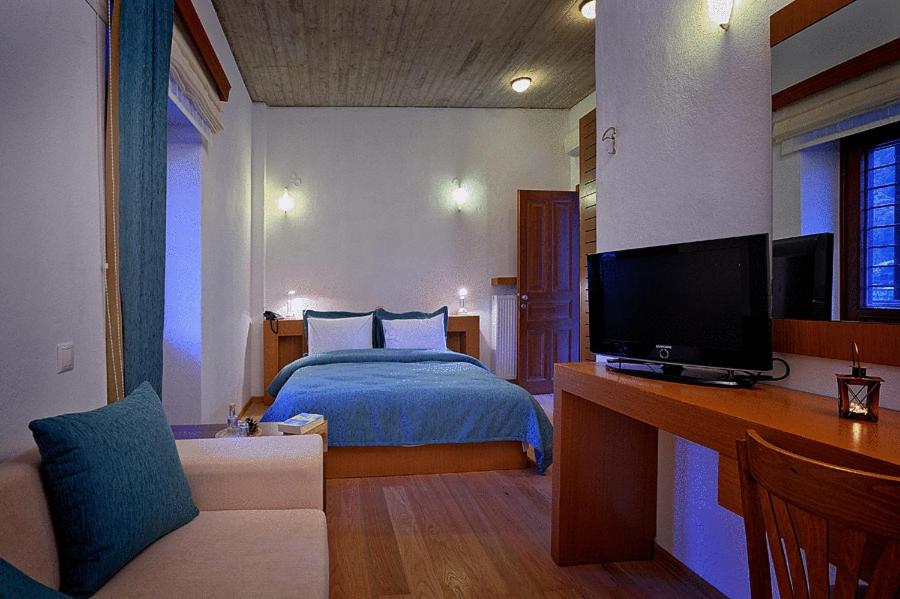 Postel nebo postele na pokoji v ubytování Kerasies Guesthouse