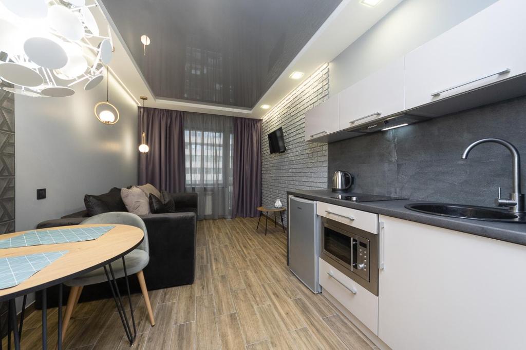 Kuchyň nebo kuchyňský kout v ubytování Tomas apartments