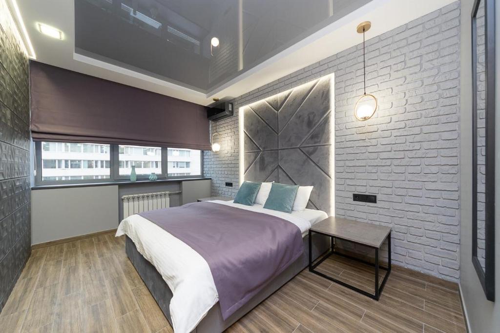 Postel nebo postele na pokoji v ubytování Tomas apartments