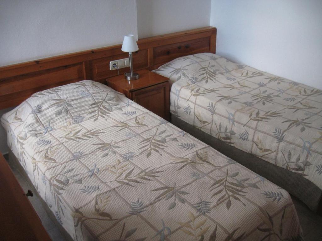 Postel nebo postele na pokoji v ubytování Elze Hotel