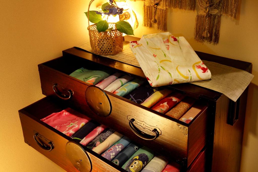 a wooden drawers filled with lots of different types at Wafu-no-Yado MASUYA in Yamanouchi