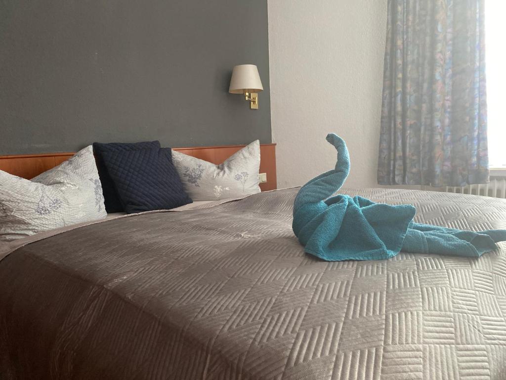 Postel nebo postele na pokoji v ubytování Hotel Oberledinger Hof