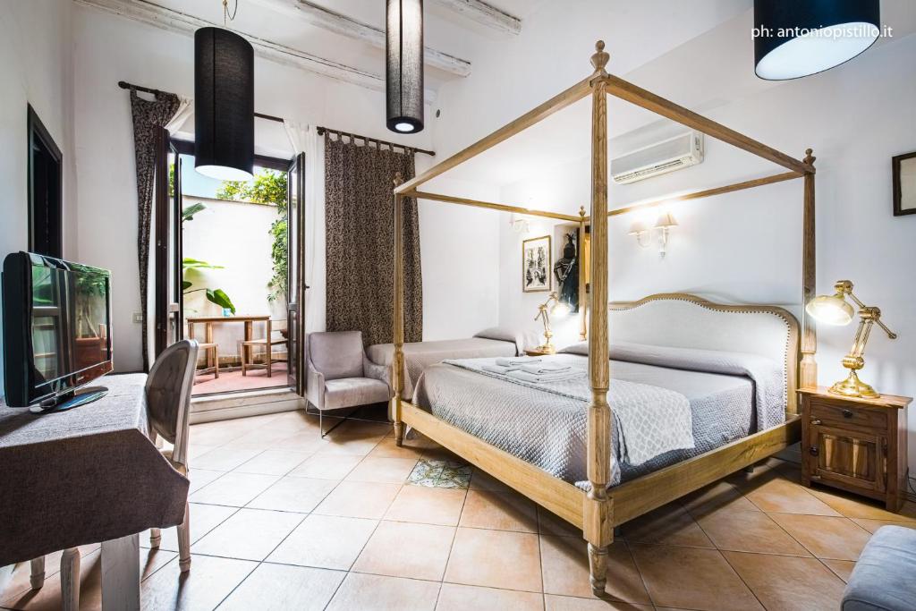 Postel nebo postele na pokoji v ubytování Porta di Castro Boutique Hotel & Pool