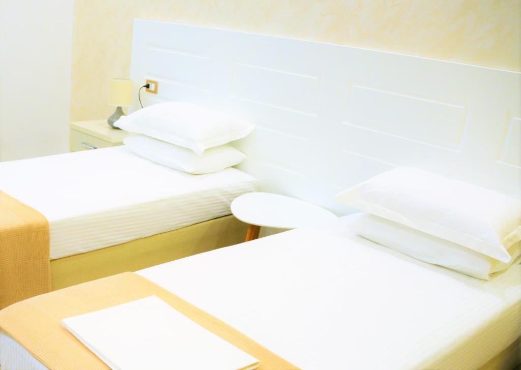 Postel nebo postele na pokoji v ubytování Comfort Hotel