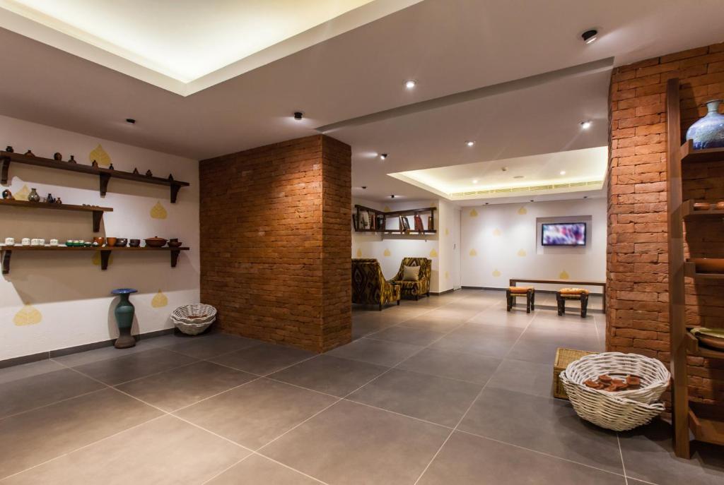 Posezení v ubytování Taj Surajkund Resort & Spa, Delhi NCR