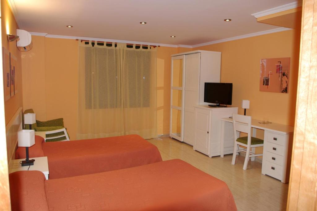 TV a/nebo společenská místnost v ubytování Apartamentos Turisticos de Hospedaje Don Diego