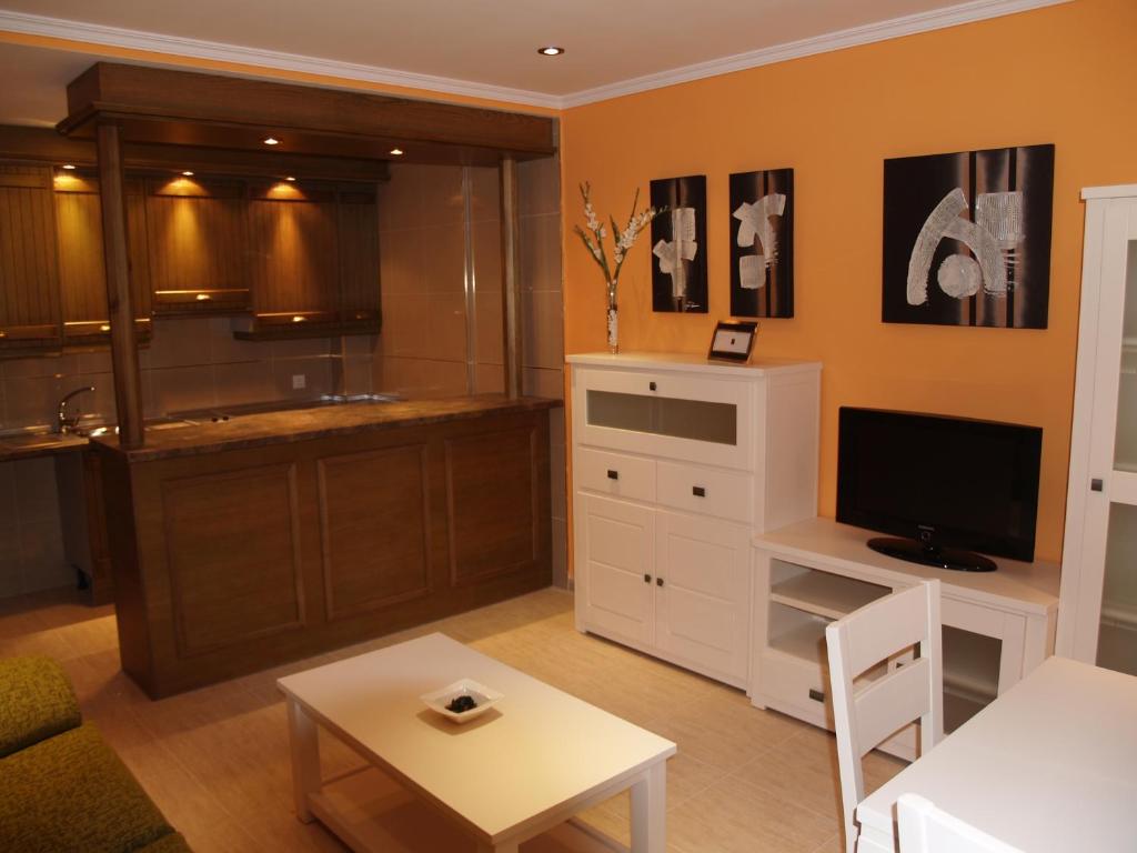 TV a/nebo společenská místnost v ubytování Apartamentos Turisticos de Hospedaje Don Diego