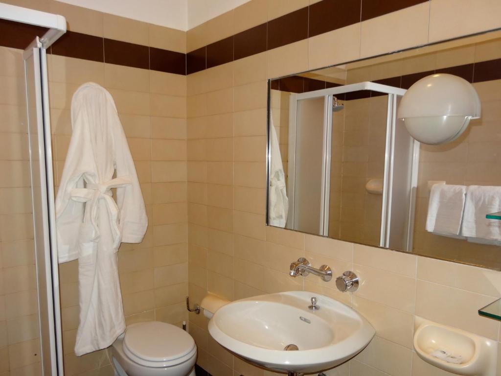 Koupelna v ubytování Golf Hotel