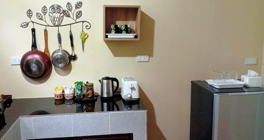 Kuchyň nebo kuchyňský kout v ubytování Rai Lung Tui Homestay