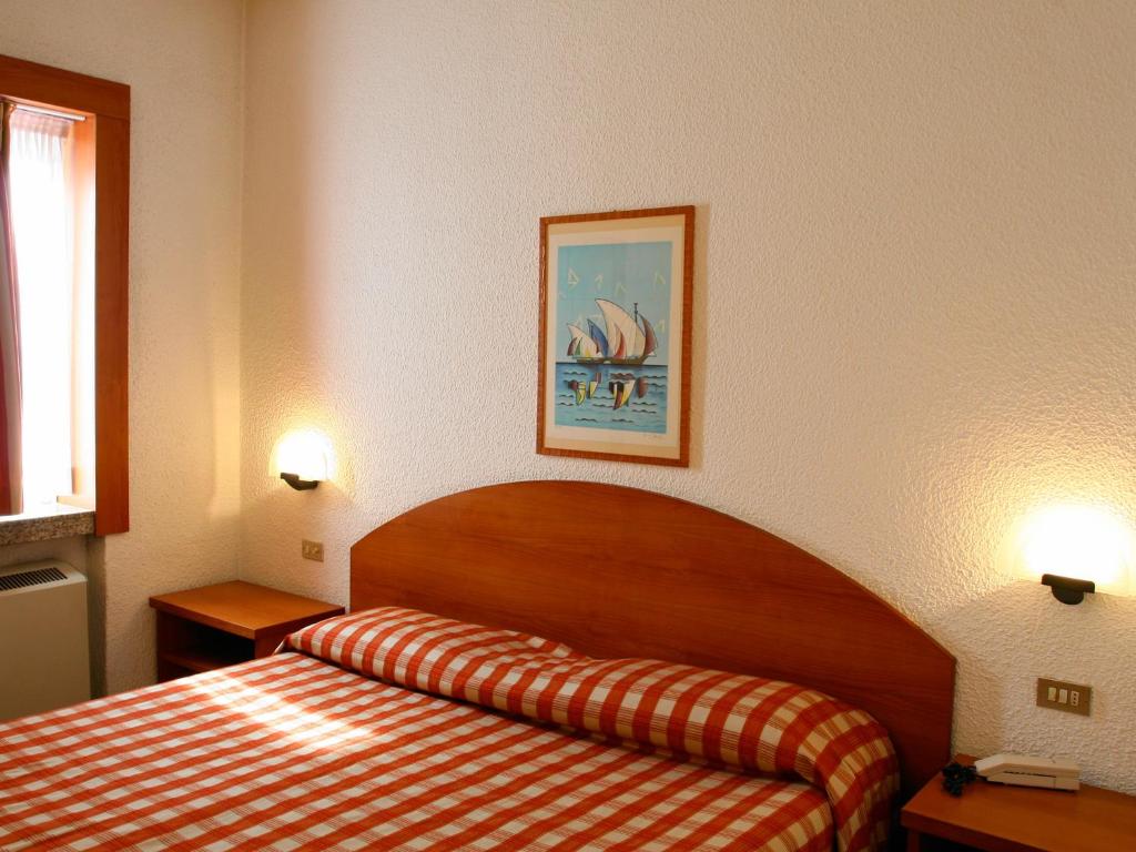 Postel nebo postele na pokoji v ubytování Golf Hotel