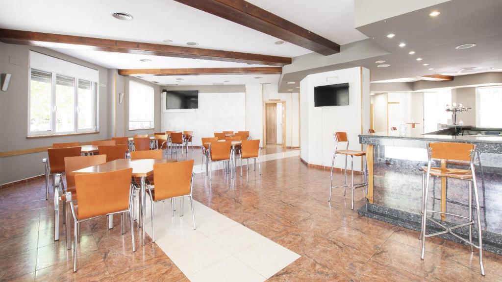 TV a/nebo společenská místnost v ubytování Hotel Isabel de Segura