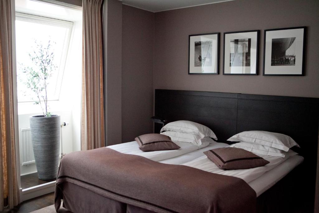 Postel nebo postele na pokoji v ubytování Hotel Villan