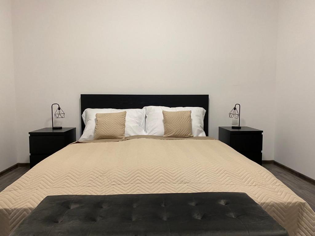 Postel nebo postele na pokoji v ubytování Boutique Apartments Liberec