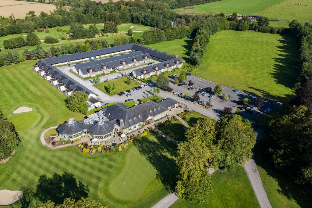 an aerial view of a large estate with a large building at The Lodges at Kilkea Castle in Kilkea