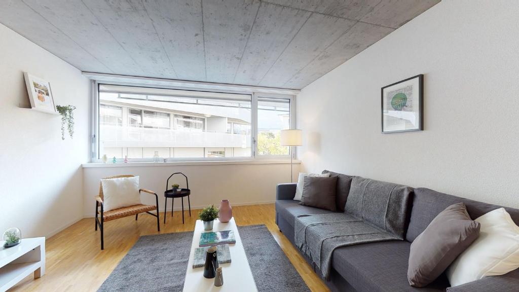 Posezení v ubytování Bright and luminous 2-bedroom-flat in downtown