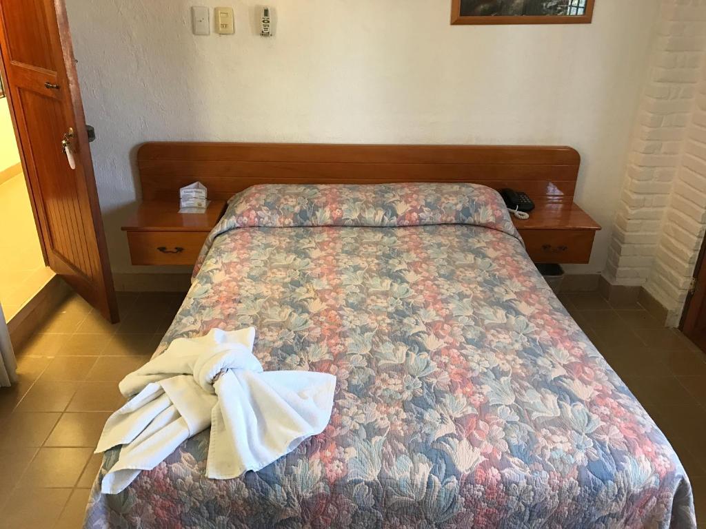 Postel nebo postele na pokoji v ubytování Arcos hotel