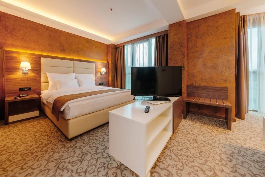 TV o dispositivi per l'intrattenimento presso Hotel New Star