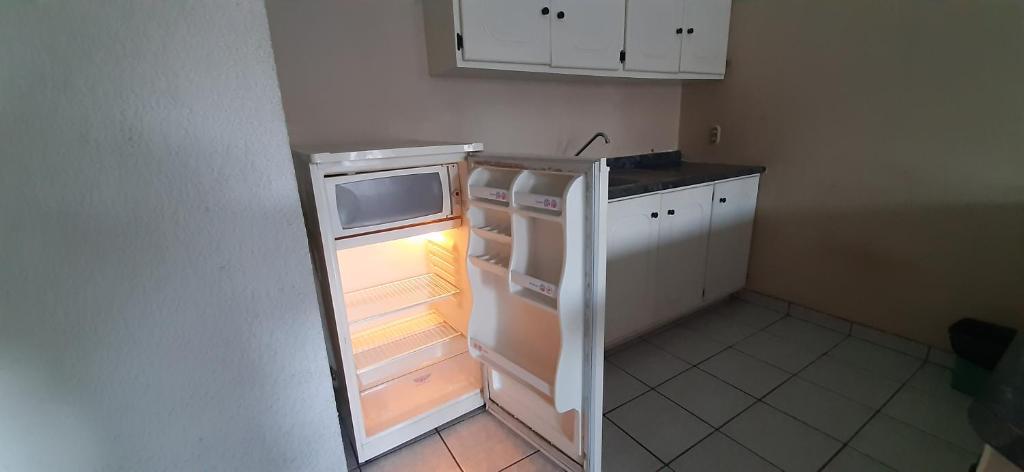 Kuchyň nebo kuchyňský kout v ubytování Hotel San Miguel
