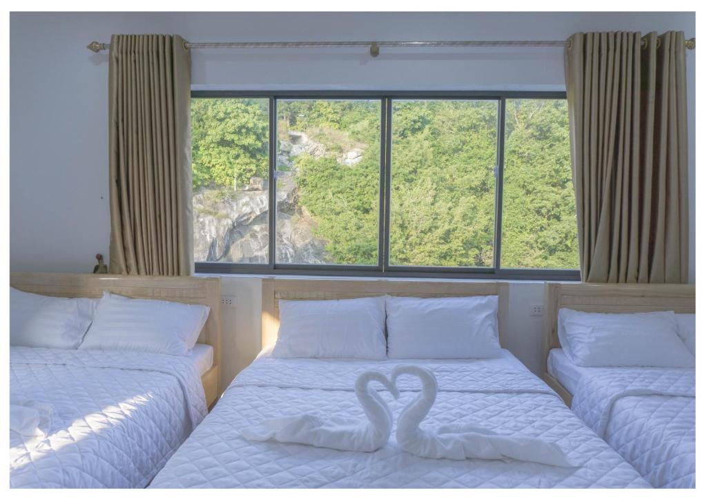 Postel nebo postele na pokoji v ubytování Chamisland Hanhly homestay