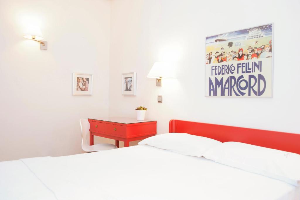 Postel nebo postele na pokoji v ubytování Hotel Sauce