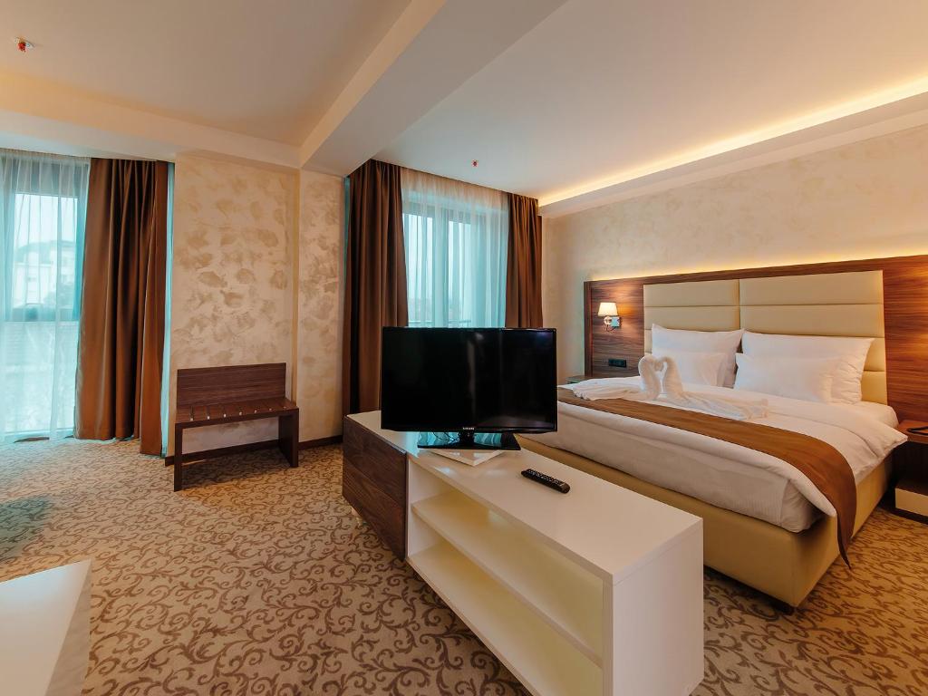 TV o dispositivi per l'intrattenimento presso Hotel New Star