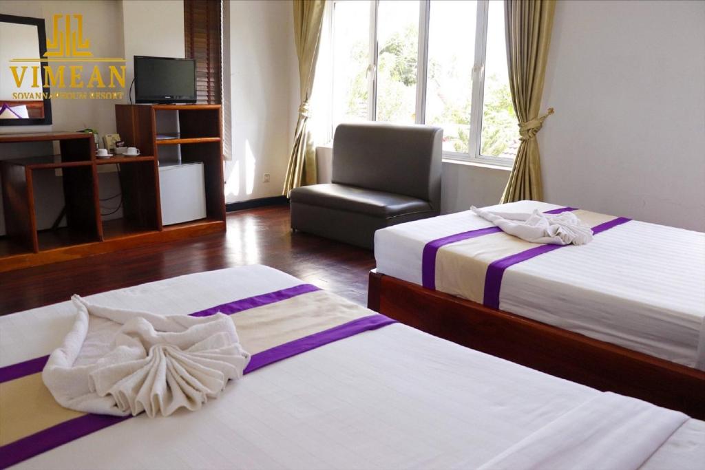 Postel nebo postele na pokoji v ubytování Vimean Sovannaphoum Resort