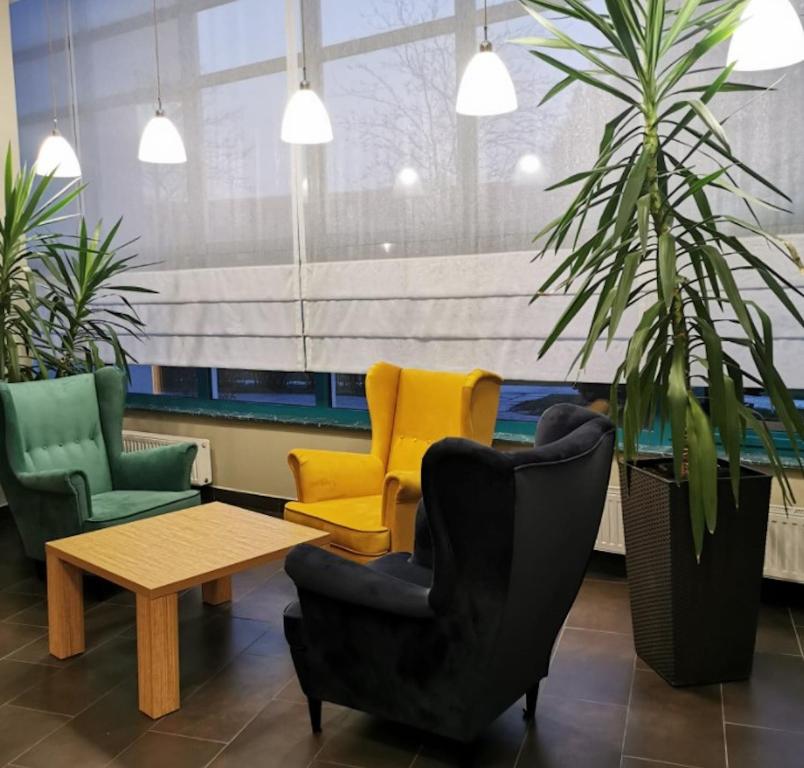 Posezení v ubytování Hotel ***NAT Sarbinowo